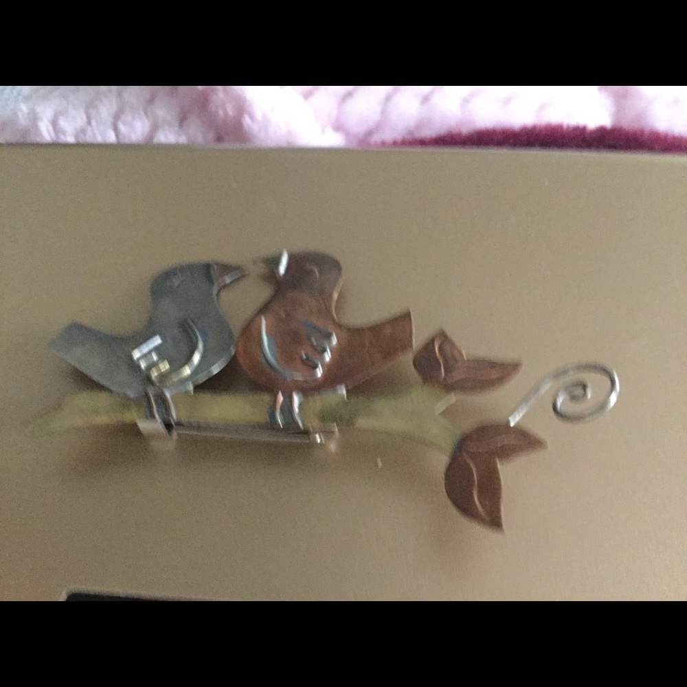 Beautiful abstract metal brooch